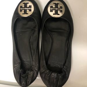 Used condition black Tory Birch Reva flats with silver emblem
